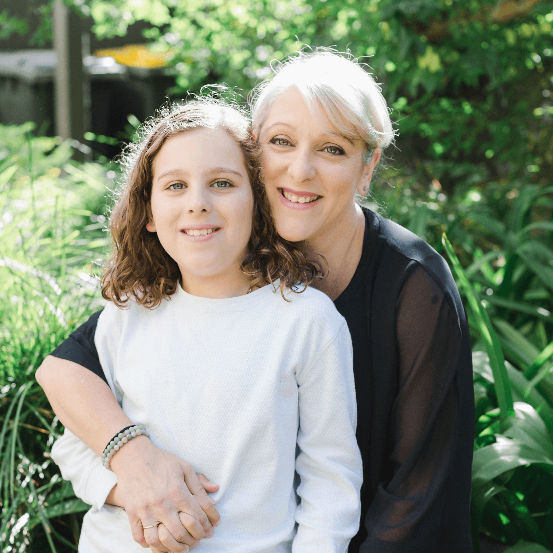 Fay, founder of Aphora Botanicals, with her son — the inspiration for the brand