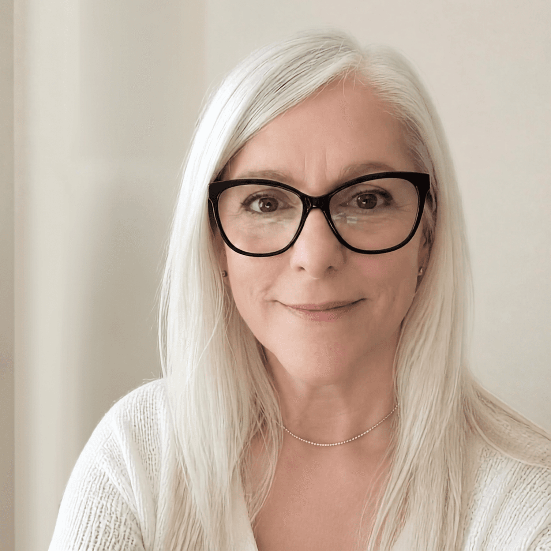 Fay, founder of Aphora Botanicals, photographed in soft natural light — a considered portrait of the formulator whose voice carries this essay.